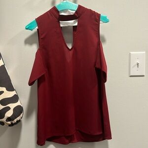 Cold shoulder boutique top. Maroon/burgundy in color.